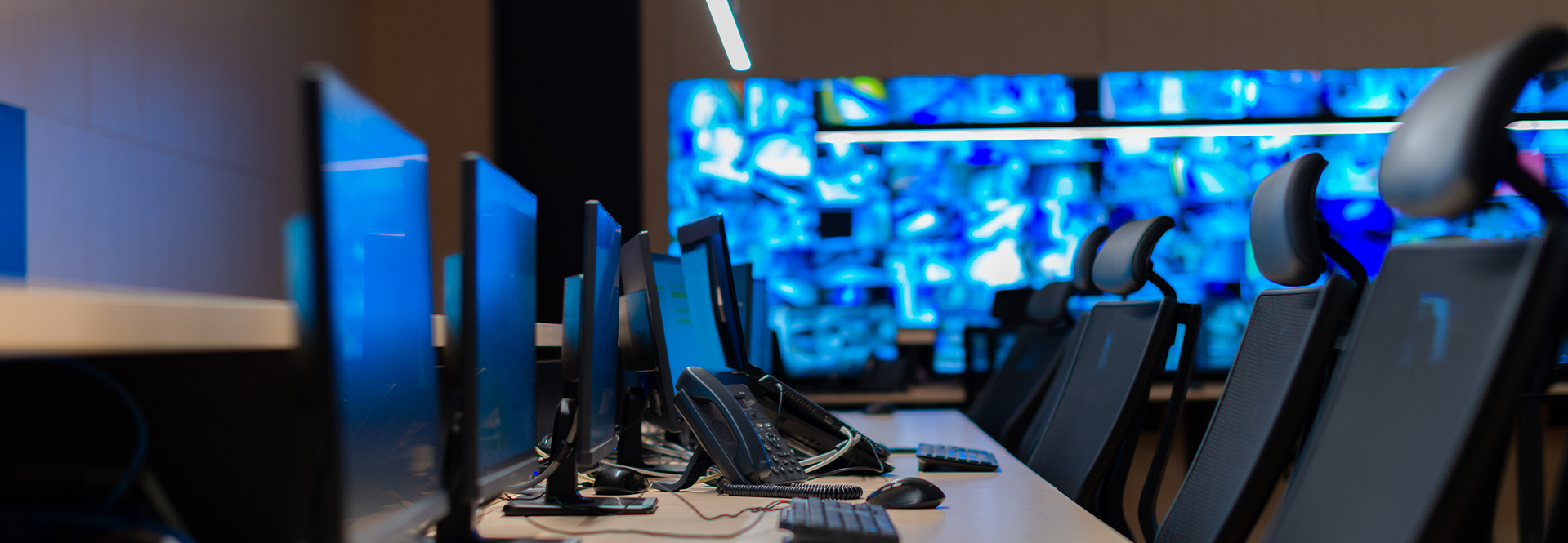 computers and telephones for the video monitoring personnel